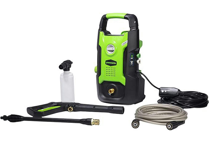 High-pressure washer in action cleaning a driveway